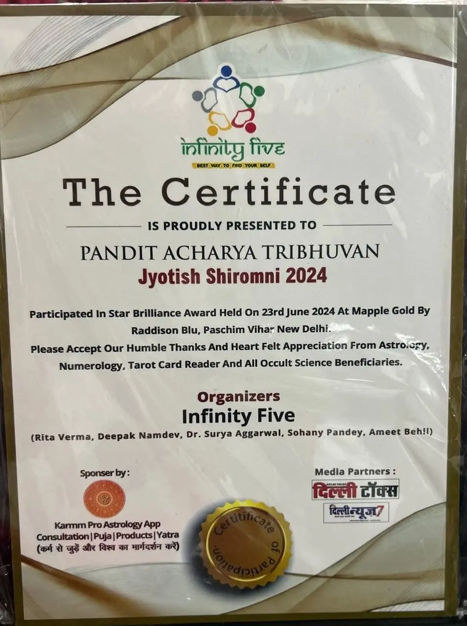 Infinity Five certificate presented to Pandit Acharya Tribhuvan, Jyotish Shiromani 2024